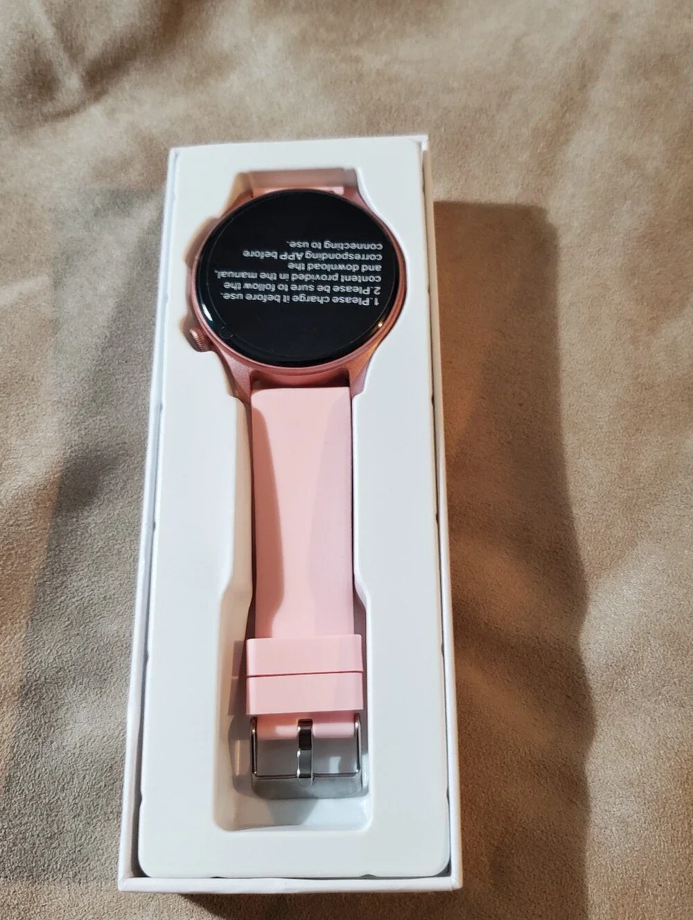 Pink Smartwatch with extra Band and Accessories